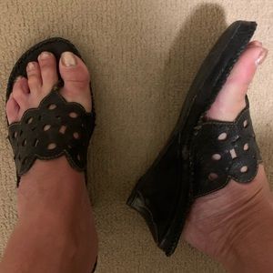 - Black Clark’s Artisan sandals